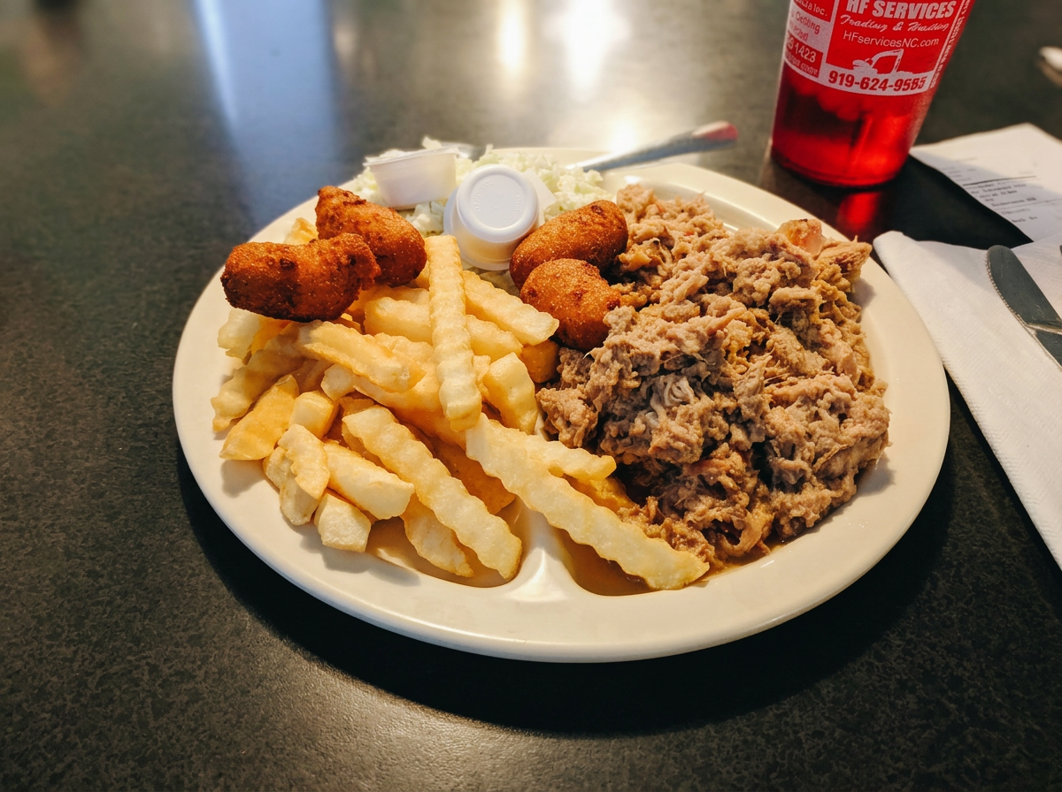 Buttermilk biscuits & sausage gravy, country fried steak, eggs and coffee at Al's Diner
